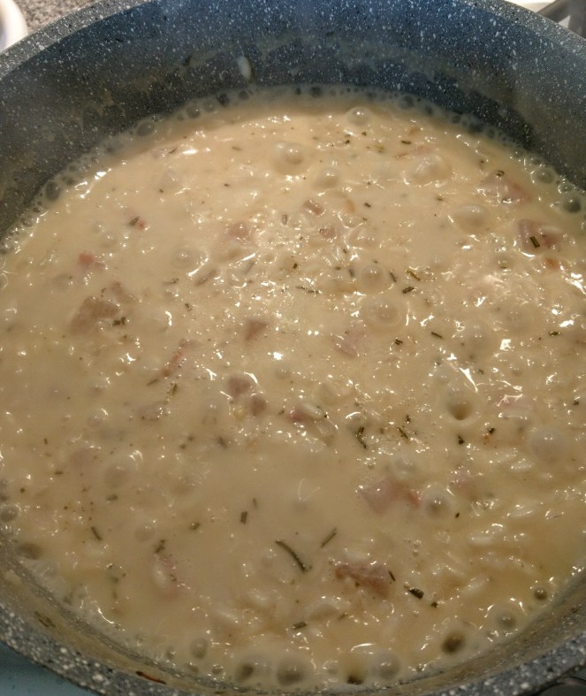 mantecatura_risotto_rosmarino_taleggio_guanciale